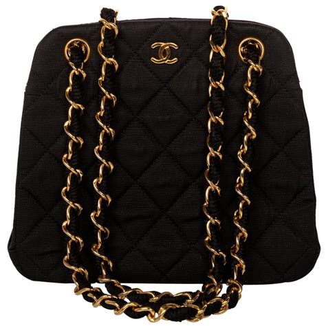 chanel black quilted bag with chain